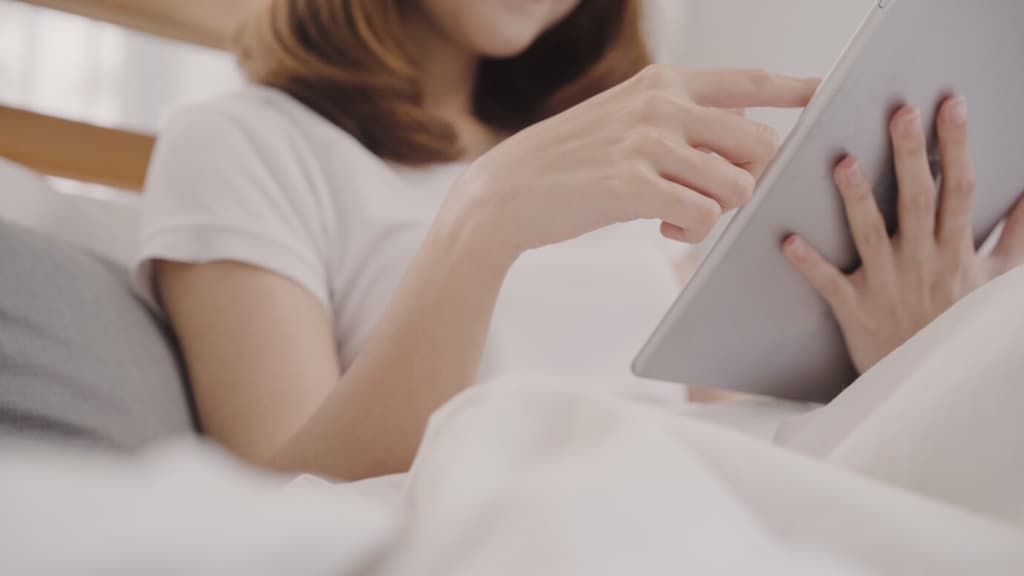 Female holding a tablet