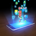 Icons of various social media apps floating above a smartphone