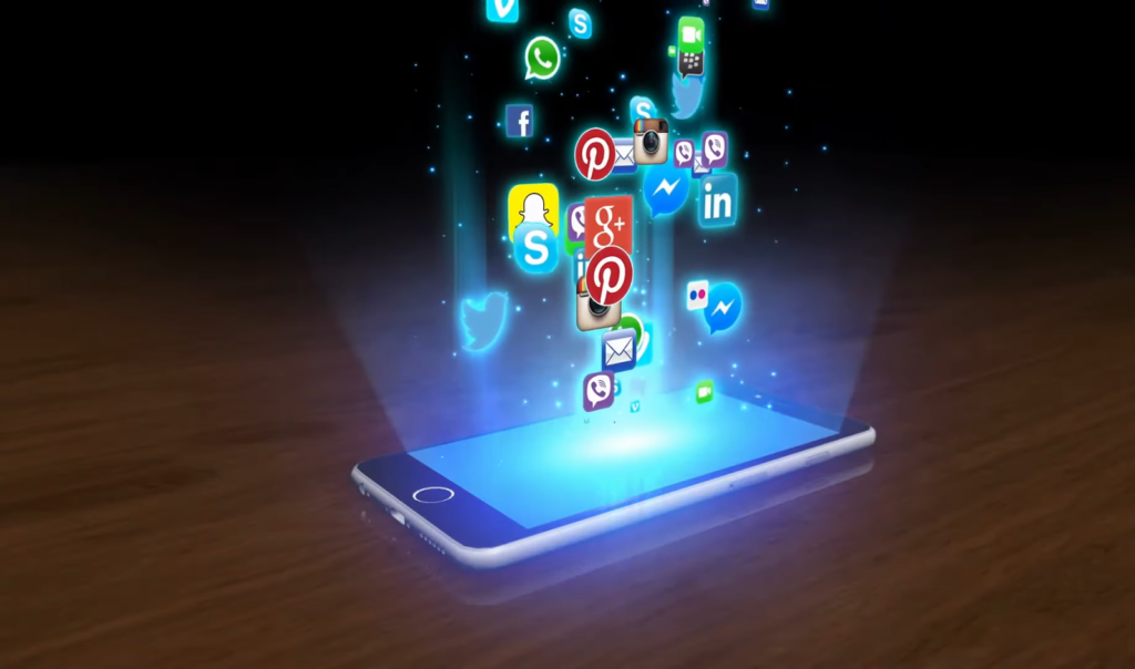 Icons of various social media apps floating above a smartphone
